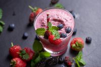 delicious-strawberry-mulberry-blueberry-smoothie-garnished-with-fresh-berries-mint-glass-soft-focus-beautiful-appetizer-pink-raspberries-well-being-weight-loss-concept (1)